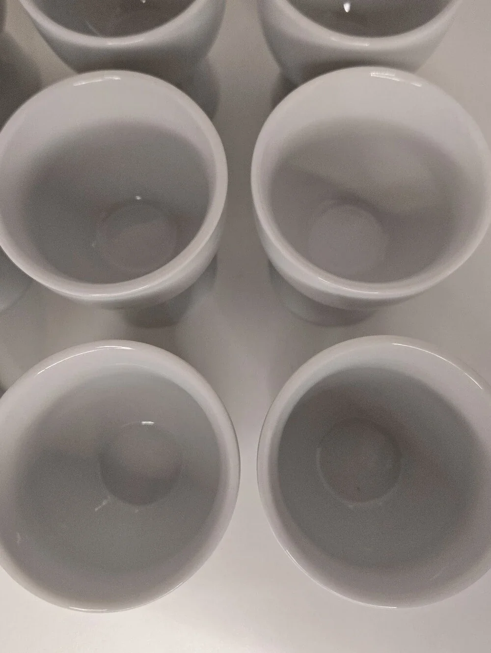 Set of 12 White Porcelain Double Egg Cups